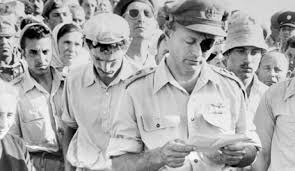 Dayan giving the eulogy at Nahal Oz settlement, April, 1956